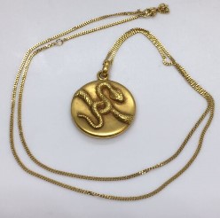 14 karat snake locket .Made in America.  Nobel Antique Jewelry Store, Santa Monica, Ca.
